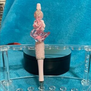 Beautiful pink beaded pen with matching swan.